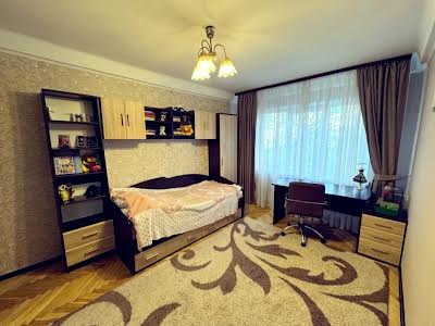 квартира по адресу Строителей ул., 12-Б
