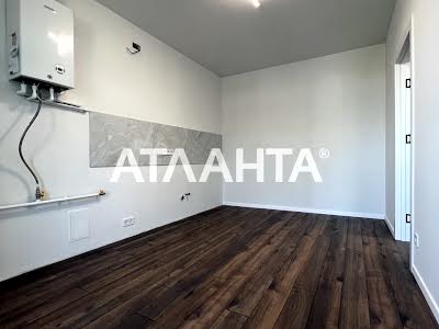квартира за адресою с. Гатне, Сімейна вул., 1