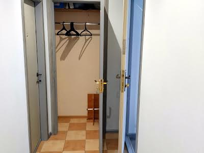комерційна за адресою Миколи Міхновського бульв. (Дружби Народів), 25