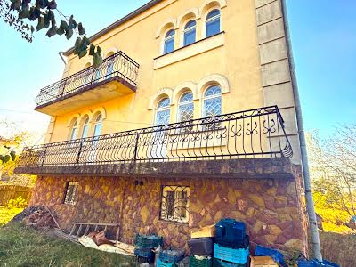 дом по адресу Кобилянської