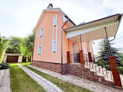 будинок за адресою Листопадна вул.