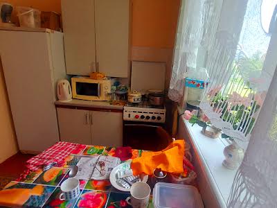 будинок за адресою с. Мотовилівка, 8-а Садова, 315