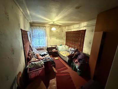 будинок за адресою с. Іванковичі, табачний провулок, 7