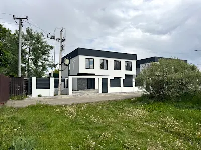 будинок за адресою смт. Козин, Піддубна