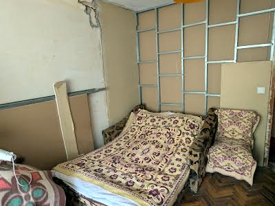 комната по адресу Будівельників пер., 8