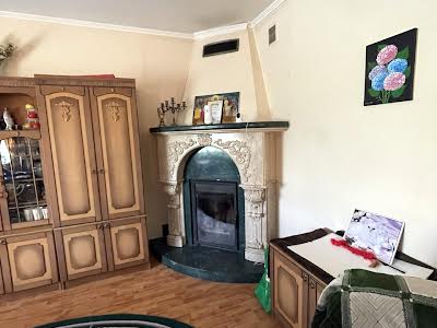 будинок за адресою с. Крюківщина, Квіткова вул., 3
