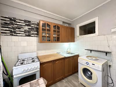 квартира за адресою Мілютенка вул., 15-А