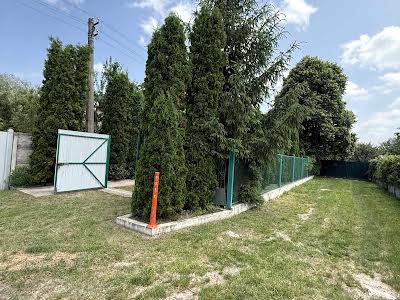будинок за адресою с. Нові Безрадичі, Садова, 99