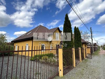 будинок за адресою с. Козаровичі, Квіткова