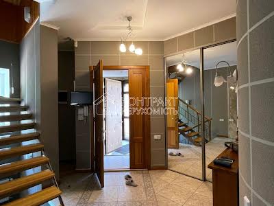 будинок за адресою Льва Ландау просп. (50-річчя СРСР), 132