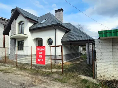будинок за адресою вул. Садова 202, 8