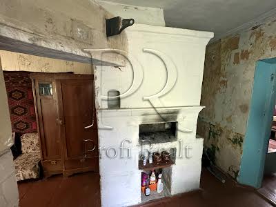 будинок за адресою с. Літки, Каштанова вулиця, 1