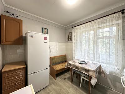 квартира за адресою Мілютенка вул., 15-А
