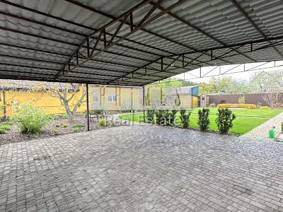будинок за адресою с. Козаровичі, Квіткова