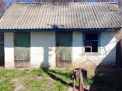 будинок за адресою с. Рожни, Господарська, 33