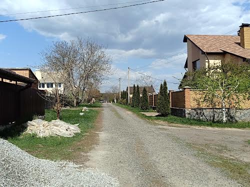 участок по адресу вул. Космічна, 52