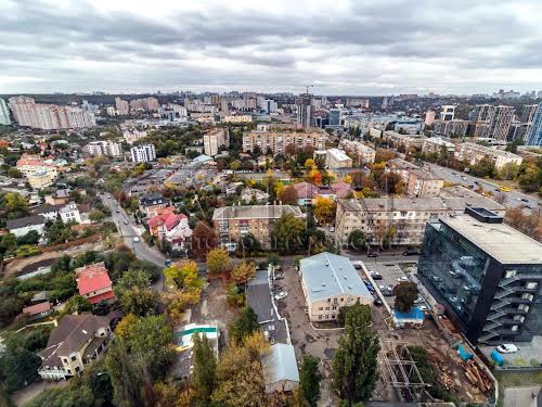 комерційна за адресою Миколи Міхновського бульв. (Дружби Народів), 14-16