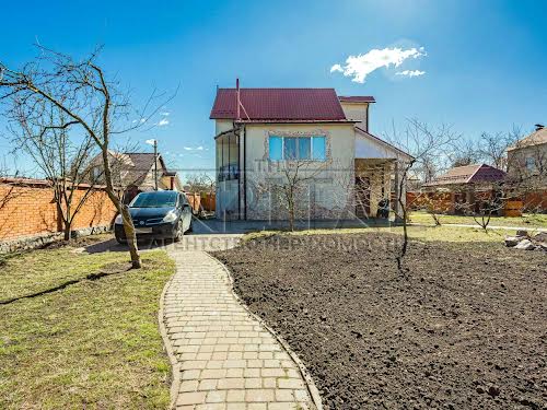 будинок за адресою с. Нові Безрадичі, Блакитна