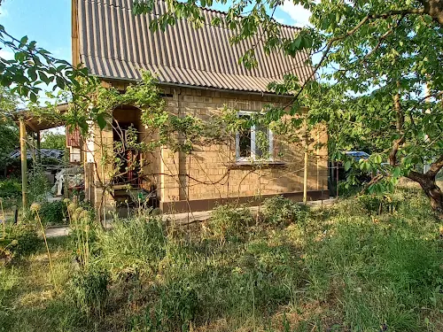дом по адресу с. Пороскотень, Центральна