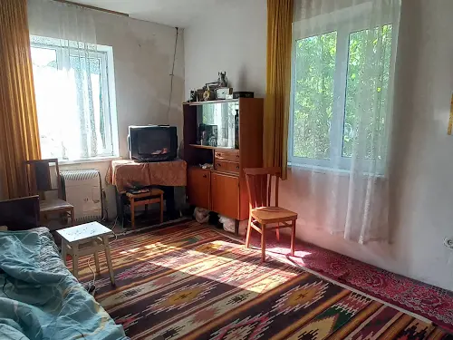 дом по адресу с. Пороскотень, Центральна